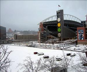 Qwest Field in background with nearly empty snow-covered parking lots during severe weather, Seattle, December 17, 2008