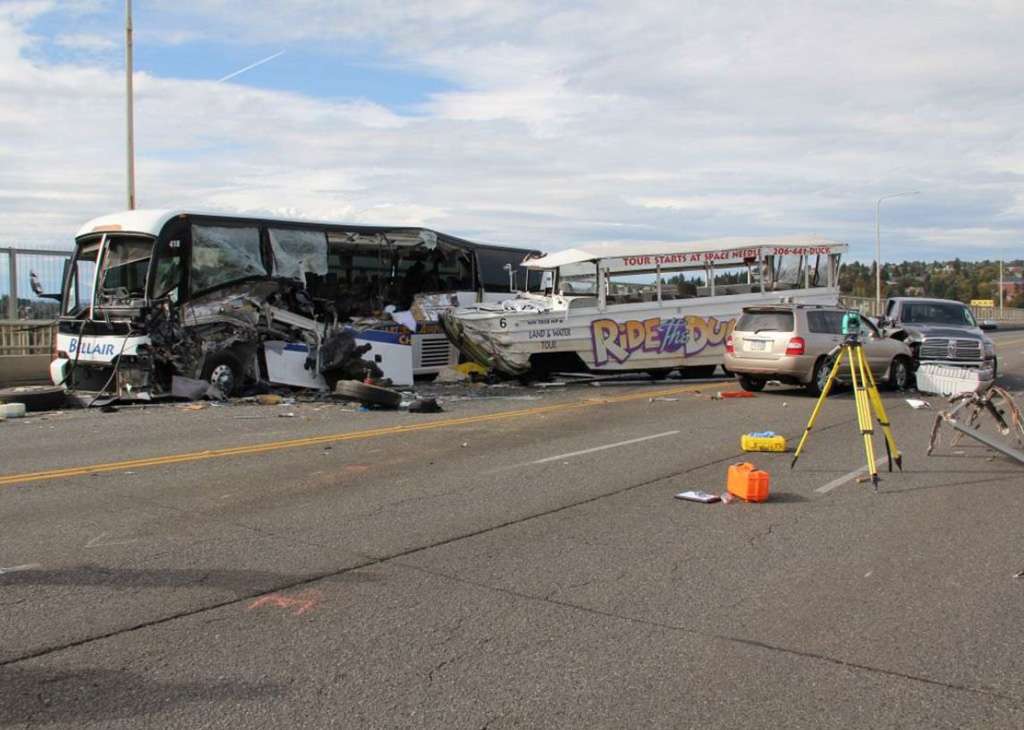 Five die and 69 are injured after Ride the Ducks amphibious tour vehicle  collides with charter bus on Aurora Bridge in Seattle on September 24,  2015. 