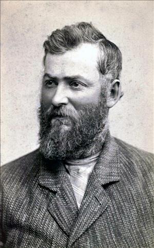 Photograph of Walter Alvadore Bull, bearded and wearing a tweed jacket