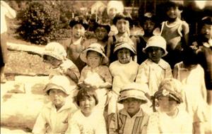 A large group of Japanese children in the sun